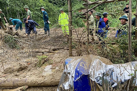 Vietnam Typhoon Yagi: Rescue workers clear mud and debris in Lang Nu hamlet